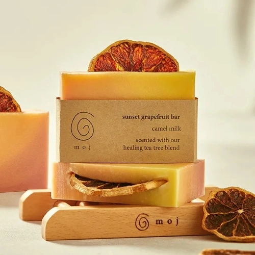 Recyclable holster-style soap packaging with minimalist design